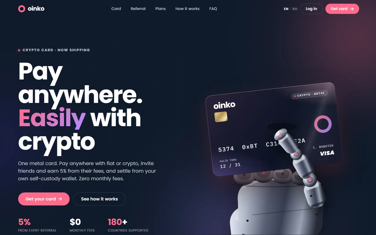 Oinko home page: a dark navy landing with a robot hand holding a metal Visa card